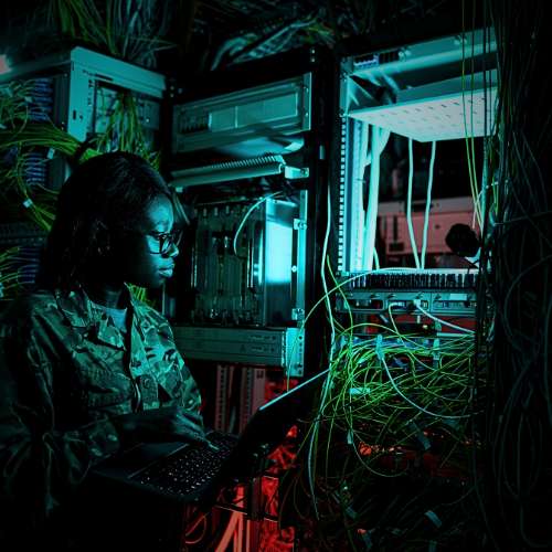 Military personnel using high-speed fiber-based command and control systems.