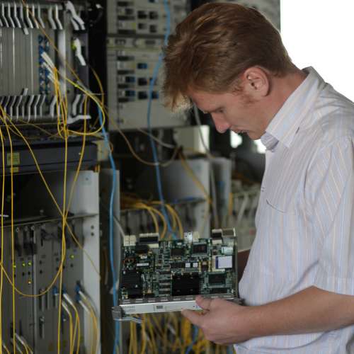Comparison of old copper cabling versus modern fiber optic bundles.