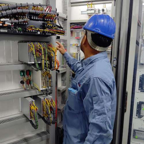 Technician inspecting tamper-proof cabling at a federal command center.